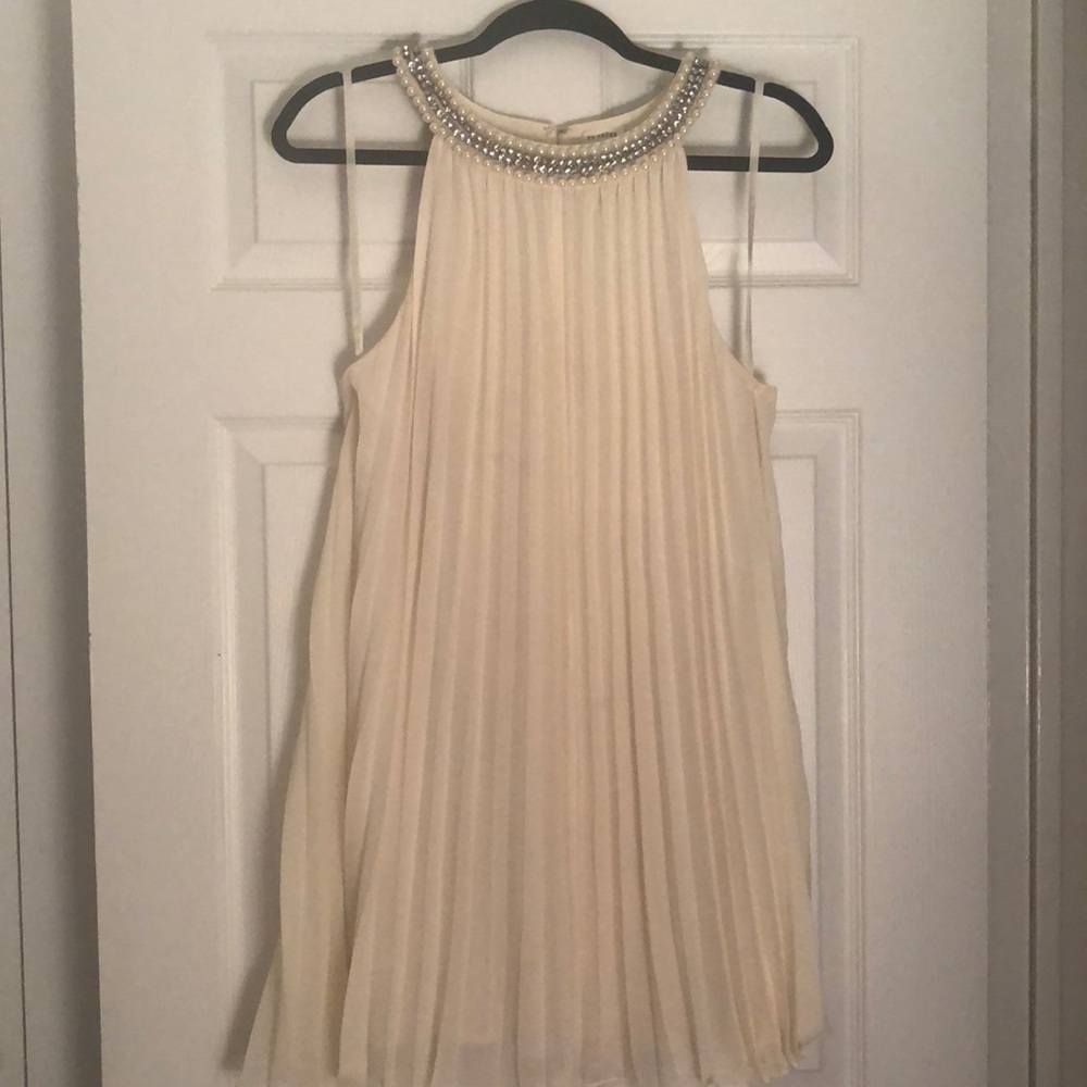 En Crème Dress with Embellishments